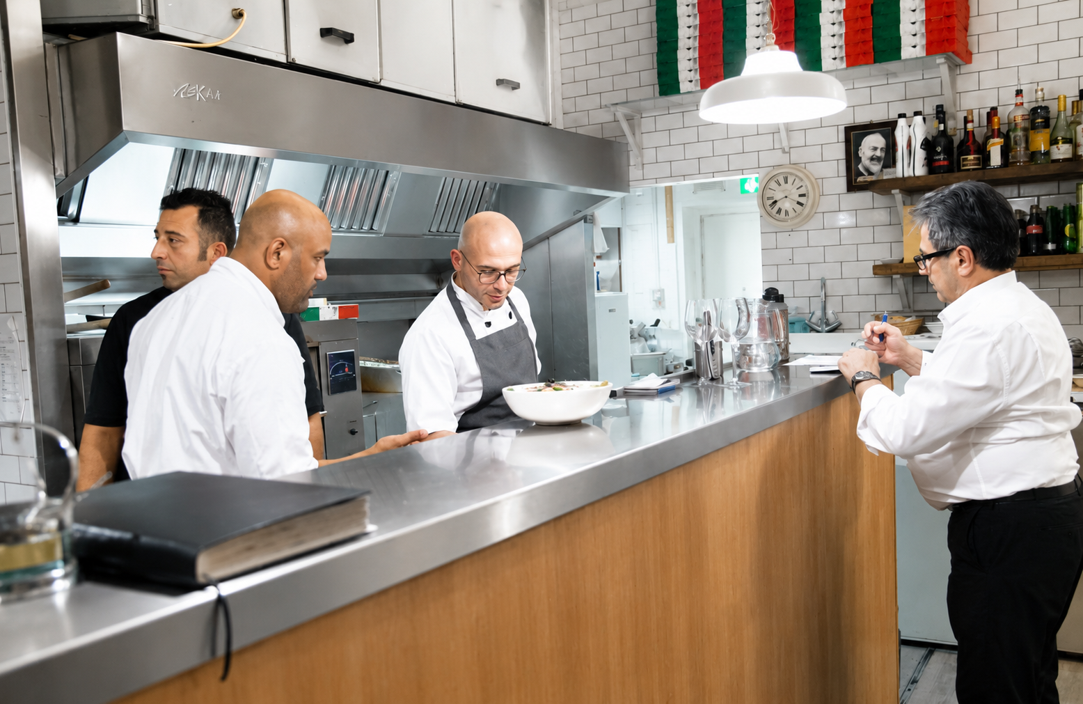 Luca cooking in the Da Luca kitchen